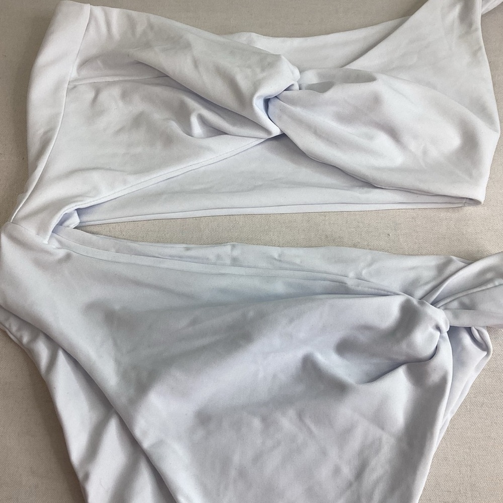 White one piece swimsuit. - Picture 2 of 8